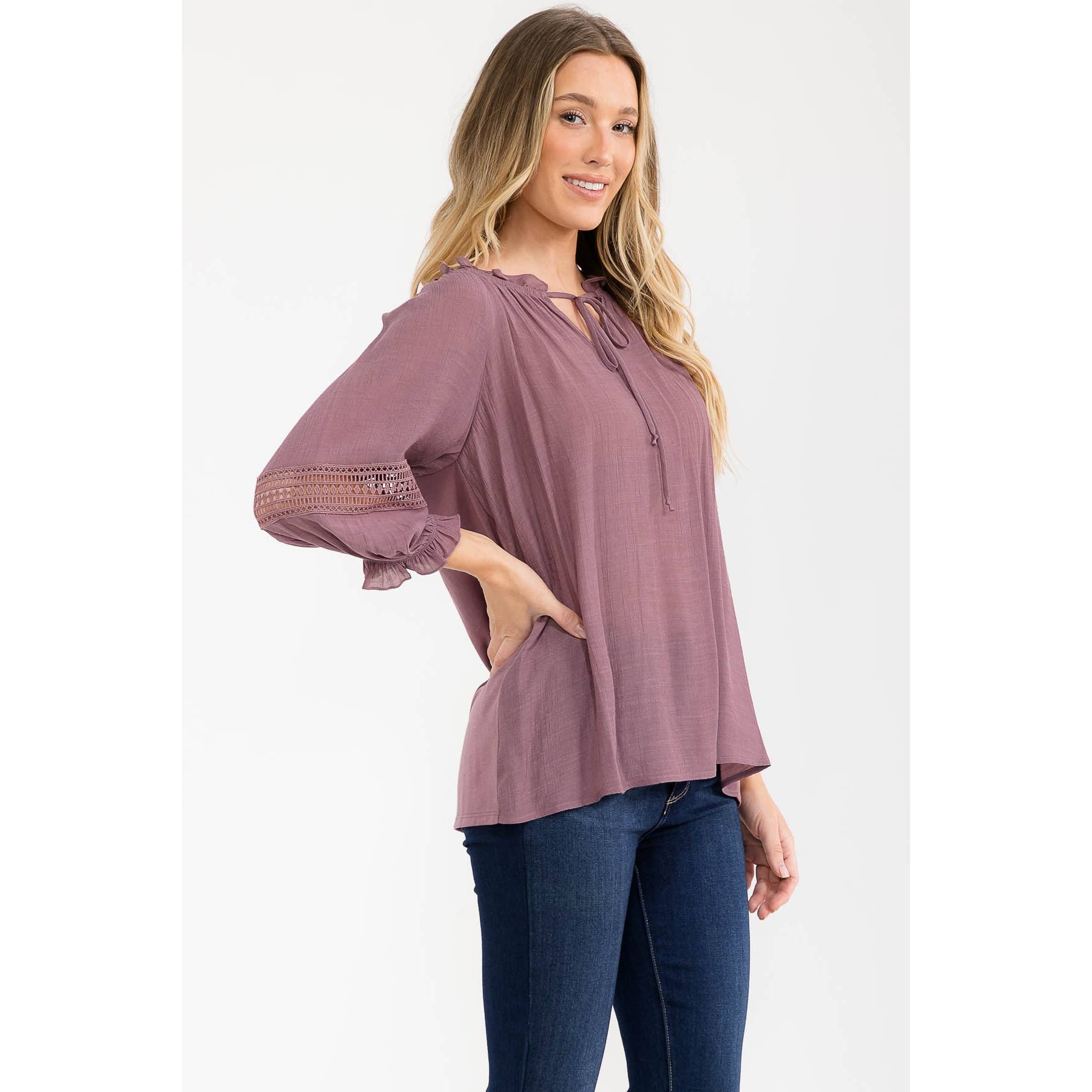 Boho crochet peasant top in New Orchard, a light plum shade.⠋