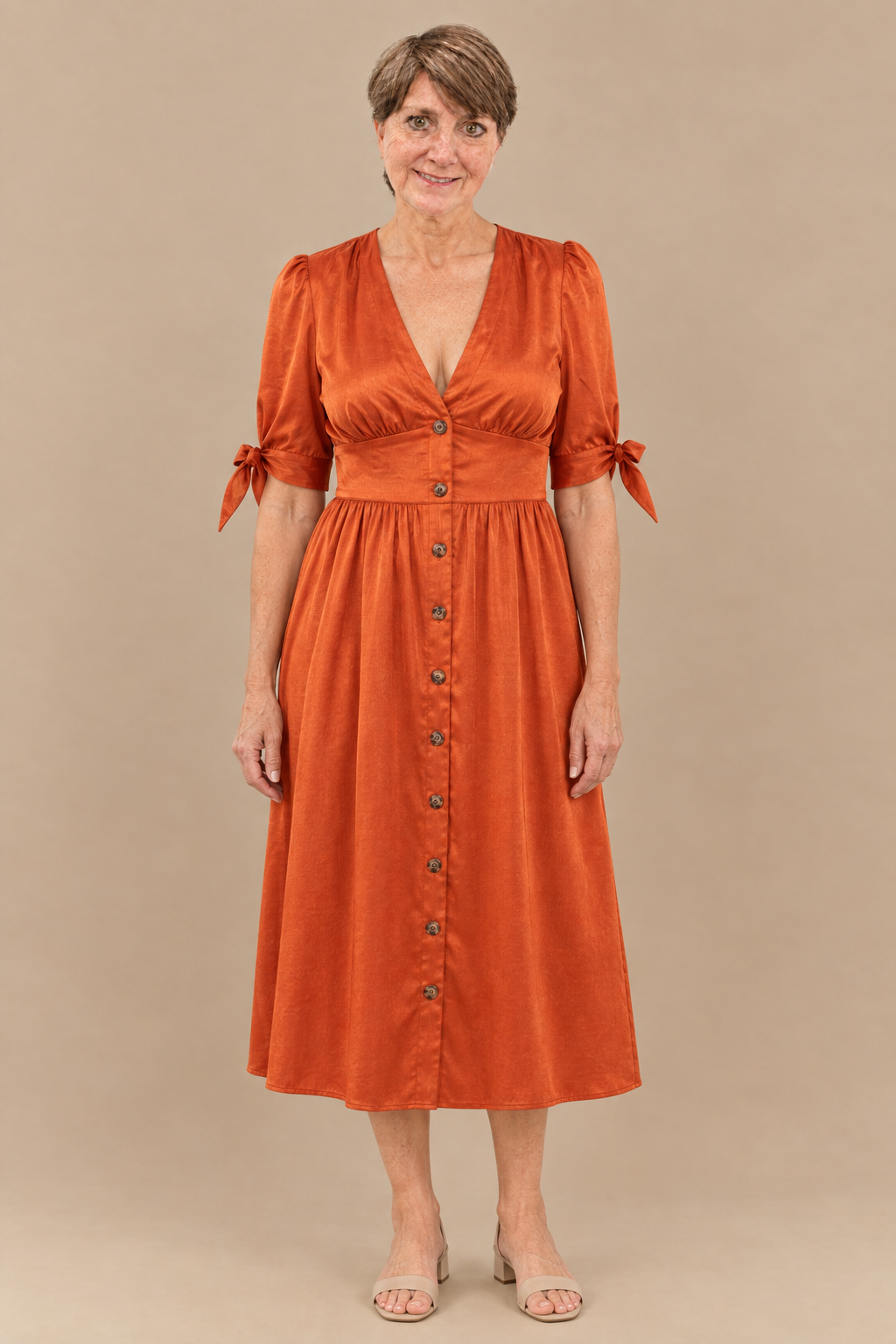 You wearing the rust-orange button-front midi dress